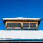 A roof with snow buildup on it